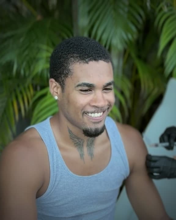 Yoelys Leal Molina smiling poolside during a Lift Aesthetics IV session