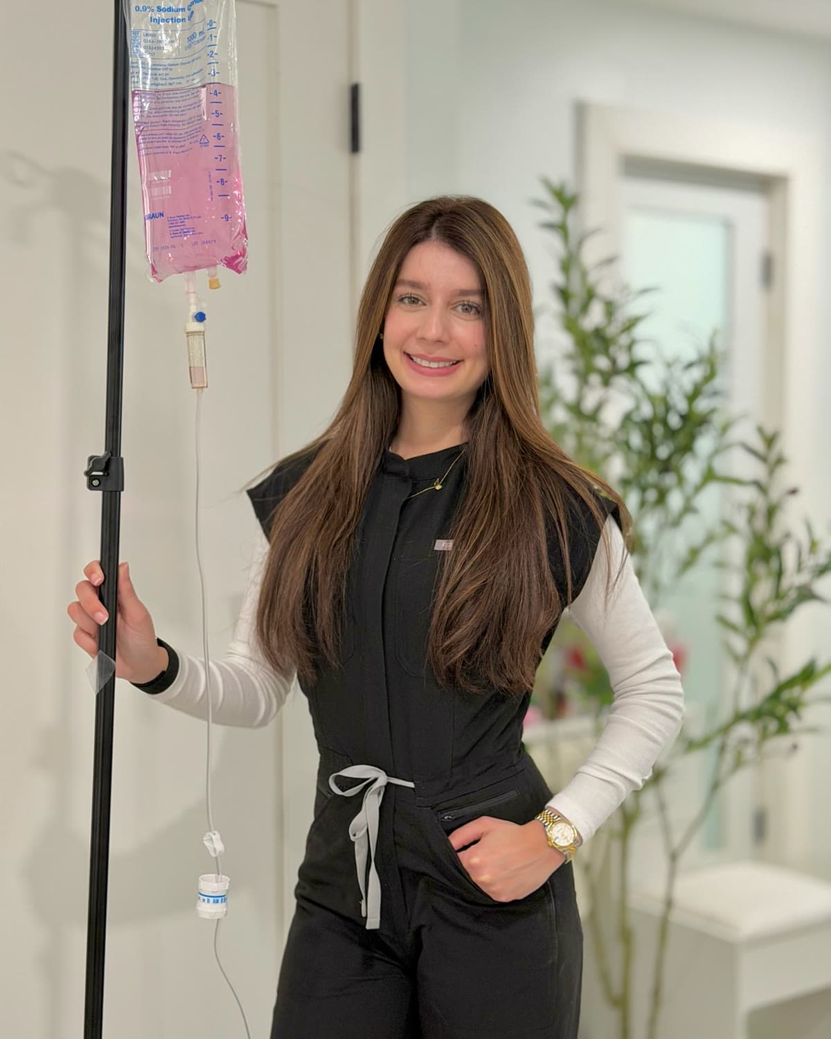 Dani, RN and founder of Lift Aesthetics, with an IV hydration setup